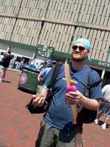 Mike holding all the bags, drinks and suntan lotion at Wrigley Field