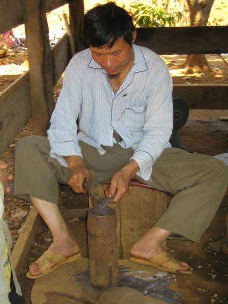 Blacksmith making 'friut-knife' blades