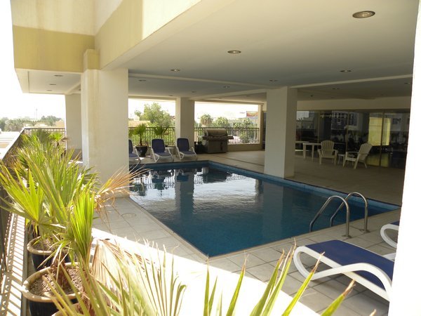 The refreshing under cover pool - with games room plus saunas next door