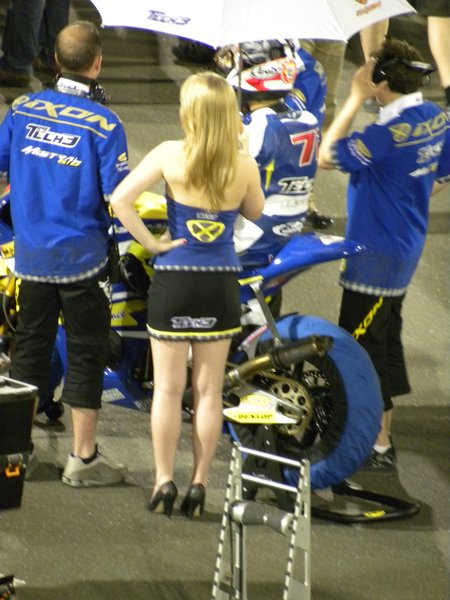 I for one am pleased they didn't tell the Umbrella Girls it was a night race! 