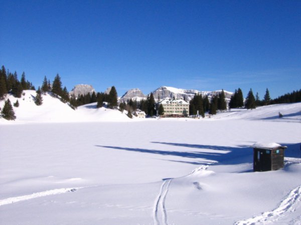 A Swiss ski lodge accross the lake