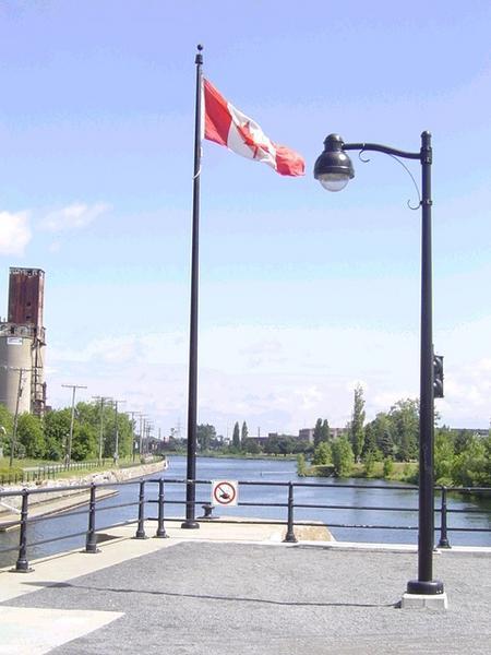 Canadian flag over Lachine canal, Montreal