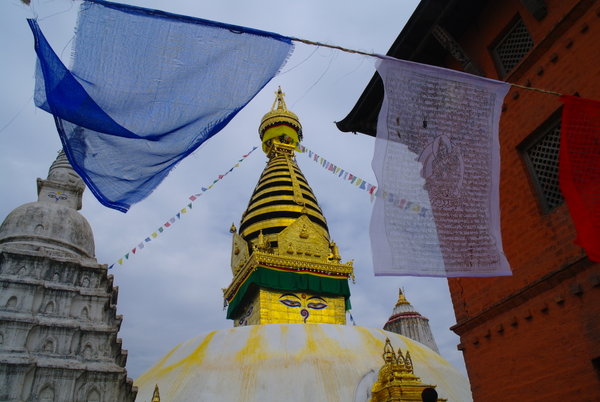 Some prayer flags and the Stupa