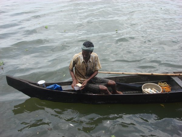 fisherman in VEMBANAD LAKE