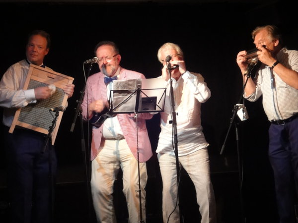 The harmonica men...
