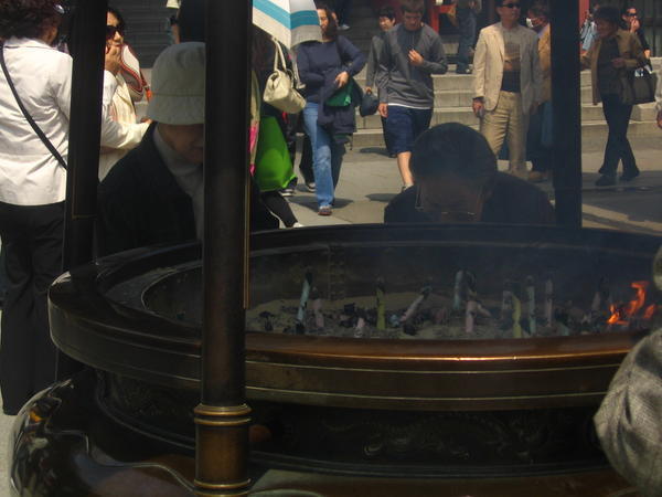 Incense burning in front of the Senso Ji