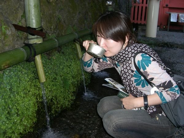 Mariko drinking water from Mt.Fuji