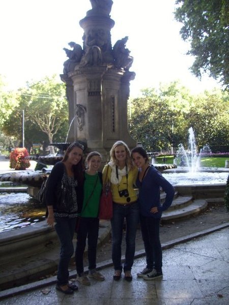 the girls in front of the fountain on the way to the park