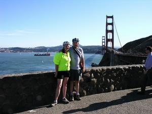 Bob and Kel biking across the SF Golden Gate Bridge. 