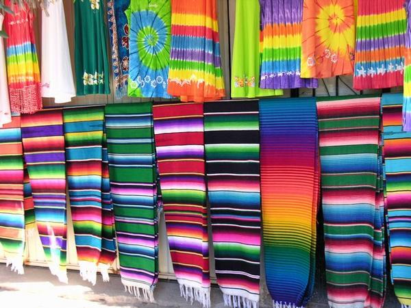 Many colorsblankets made by the natives.