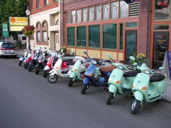 Motor Scooters in Centralia.  You have seen motorcycles in front of bars this is their version