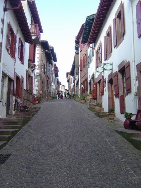 Typical narrow street, with traffic, in St. Jean Pied de Port