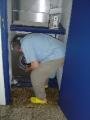 Bob struggling with the washer