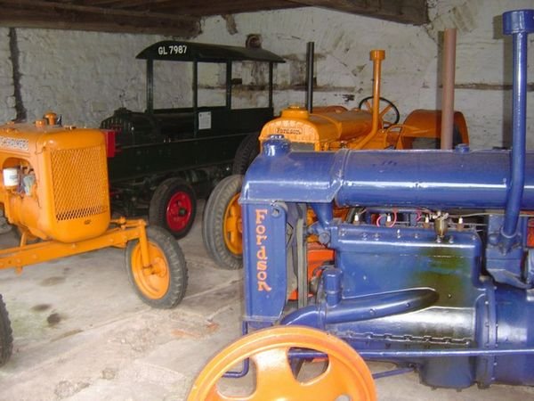 Farm building museum with old tractors