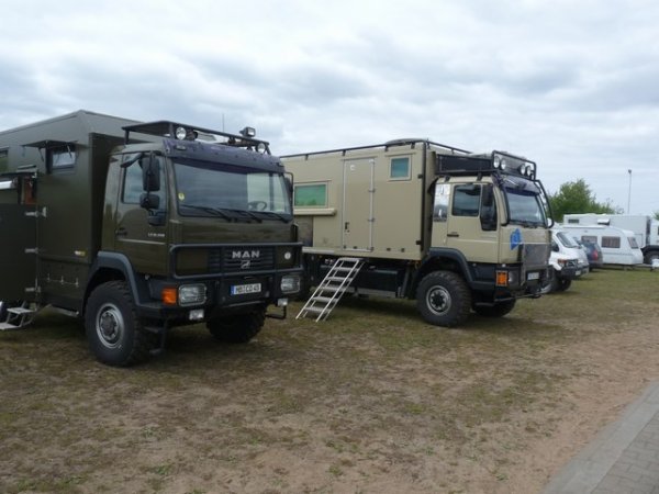 Riga Campground-- vehicles getting ready to go into Russia, China, etc, etc for 6 months (They look like attack vehicles)