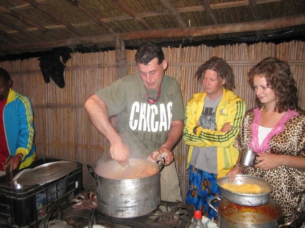 Andrea cooking up a penne pasta feast, Kande Beach Malawi