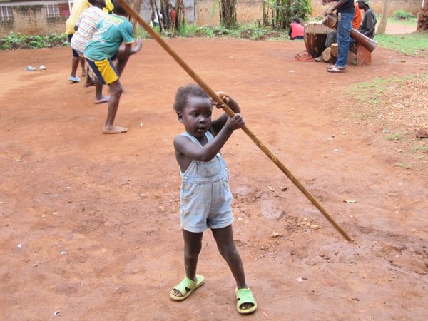 Shuku entertains me with her version of a stick dance