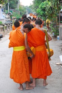 Novice Monks Collecting Alms