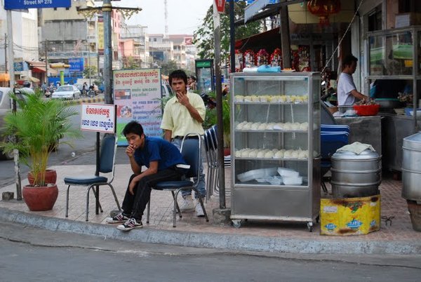 Selling dumplings on a street corner
