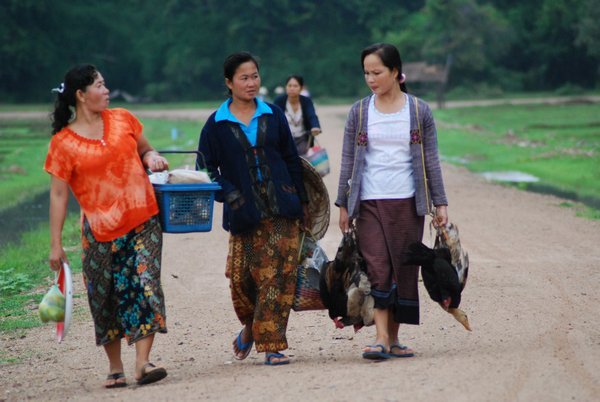 Look at these bad-ass women walking back from market with their ducks
