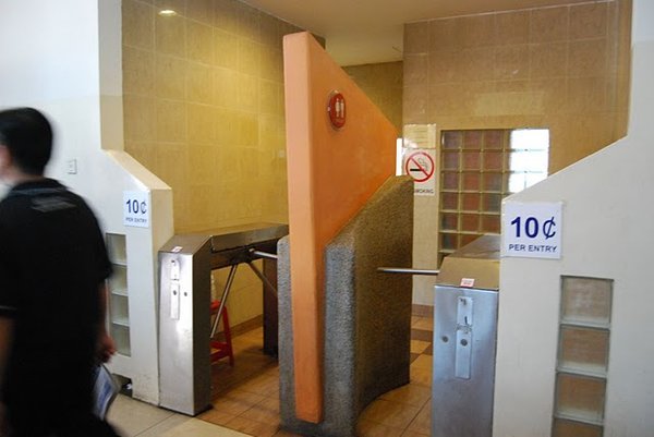 To enter the bathroom you must pay 10 cents and go thru a turnstile