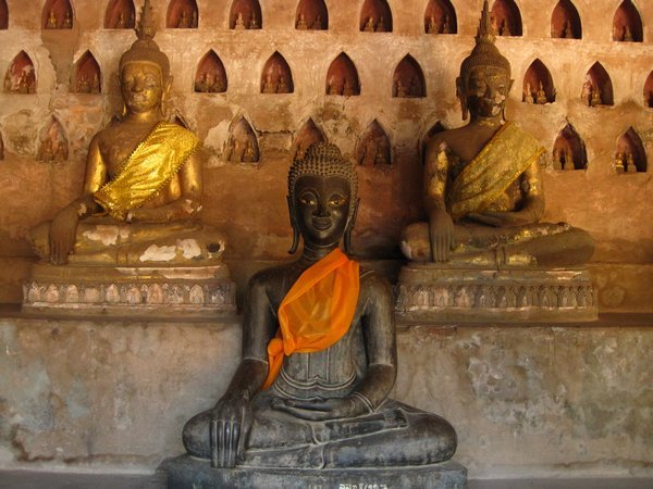 Buddha in front of Carved Enclaves Holding Tiny Buddhas