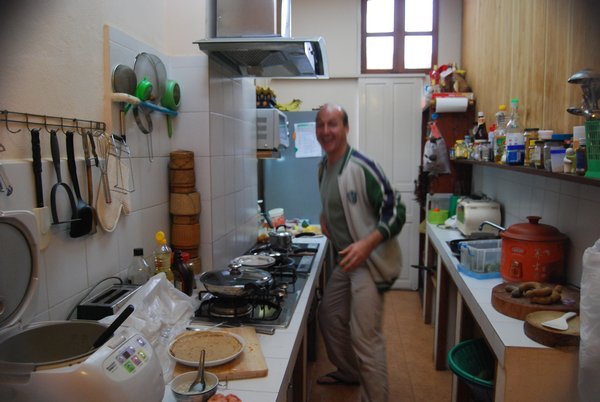 Peter, one of the guesthouse owners and a friend in the kitchen