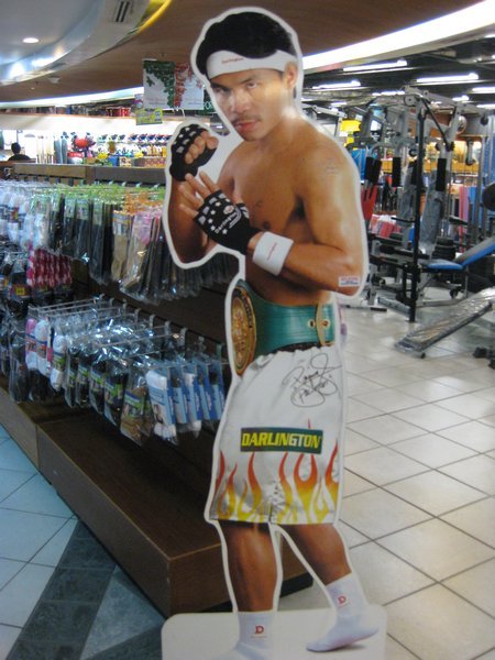 Manny's life size poster at a mall