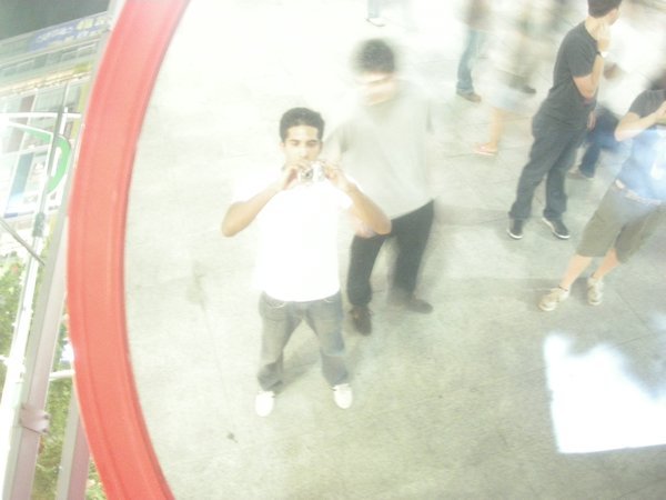 Me and Micah in the red mirror tube near Sinchon Subway Station