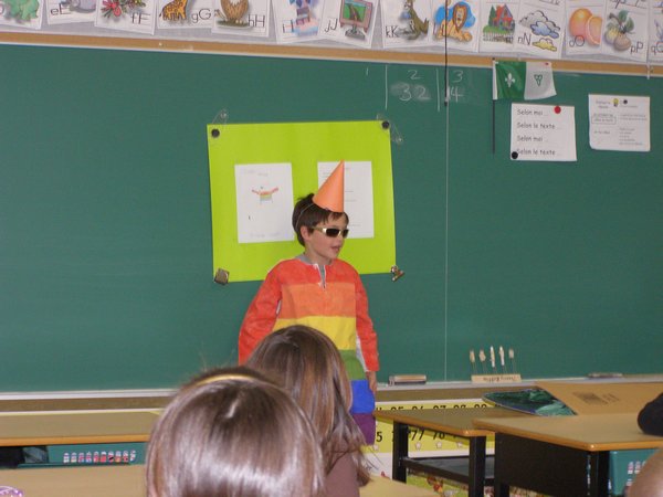 Nicolas doing a class presentation in his new school