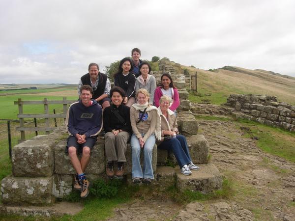 Sitting atop Hadrian's Wall.