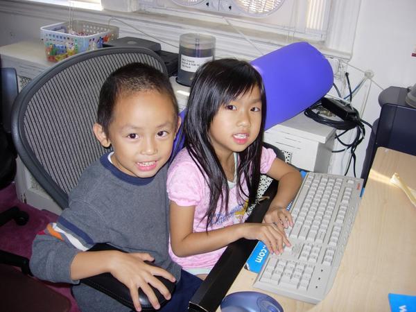 Truman and Tiffany playing computer games.