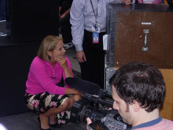 Katie Couric waiting for her cue again.