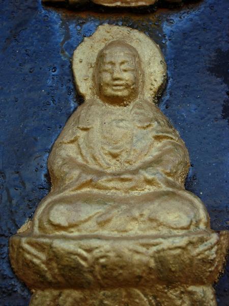 One of 10,000 Buddha's