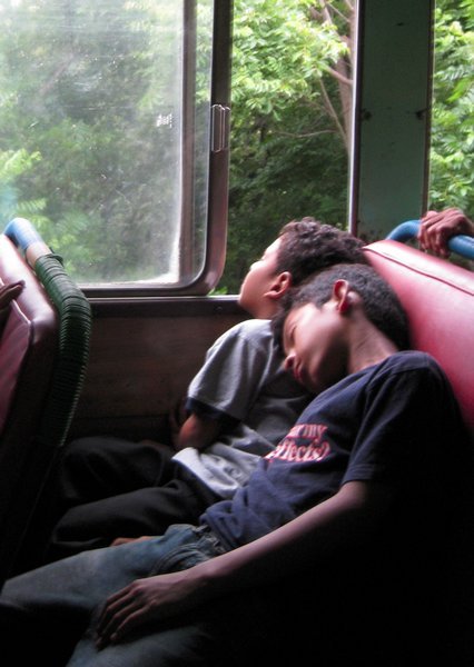 kids sleeping on the bus
