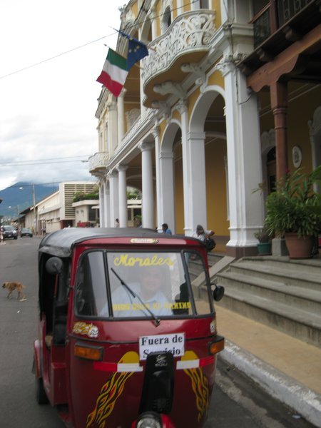 Our moto taxi outside the Italian Consulate 