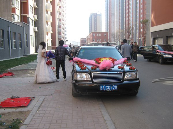 Bride and grooms car