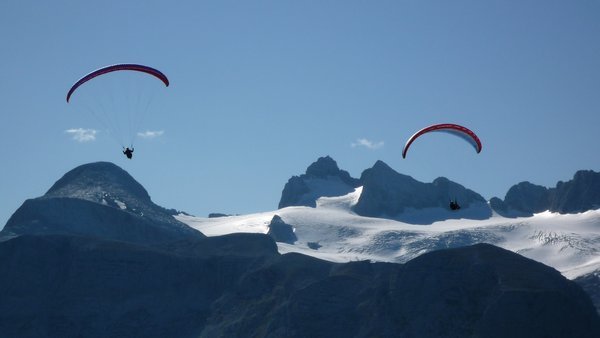 Paragliders in the Dachstein mountains