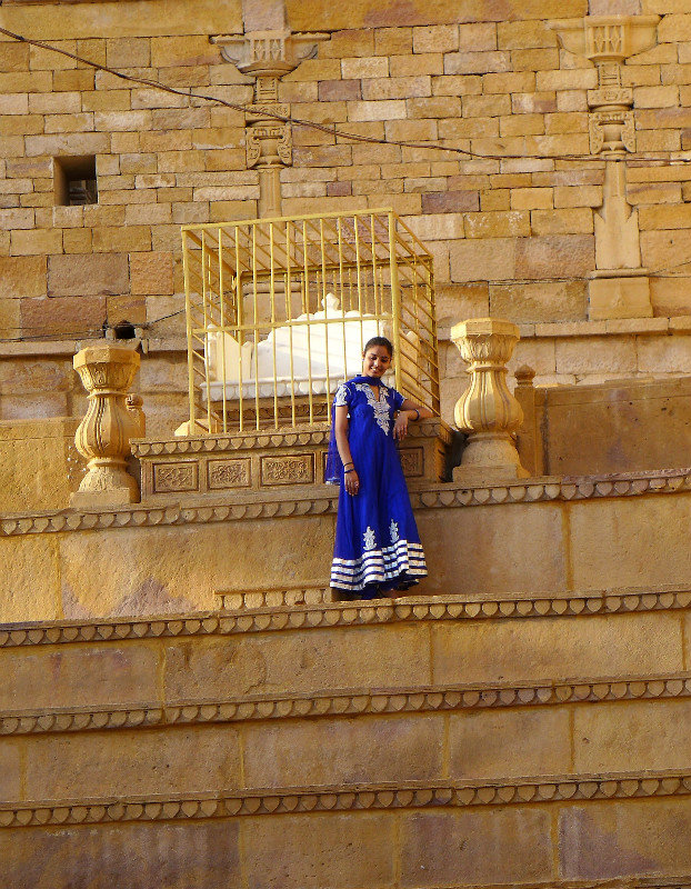 A girl posing for photos within the fort