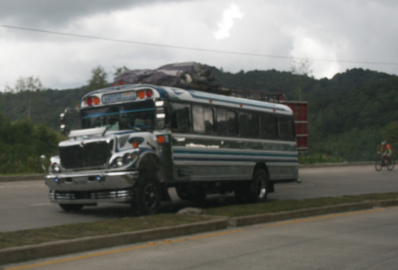 One chicken bus, plus passengers hurtles upwards