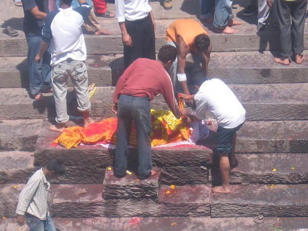 Preparing  body for funeral pyre- Kathmandu