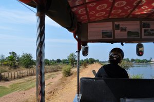 Our tuk-tuk navigating the WORST dirt road you have EVER been on - I guarantee it