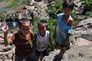 Laotian children who were trying to catch fish