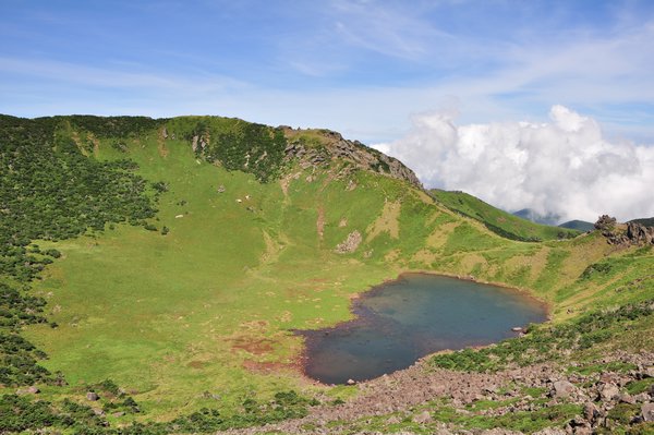 Famous crater lake at the peak of the montain