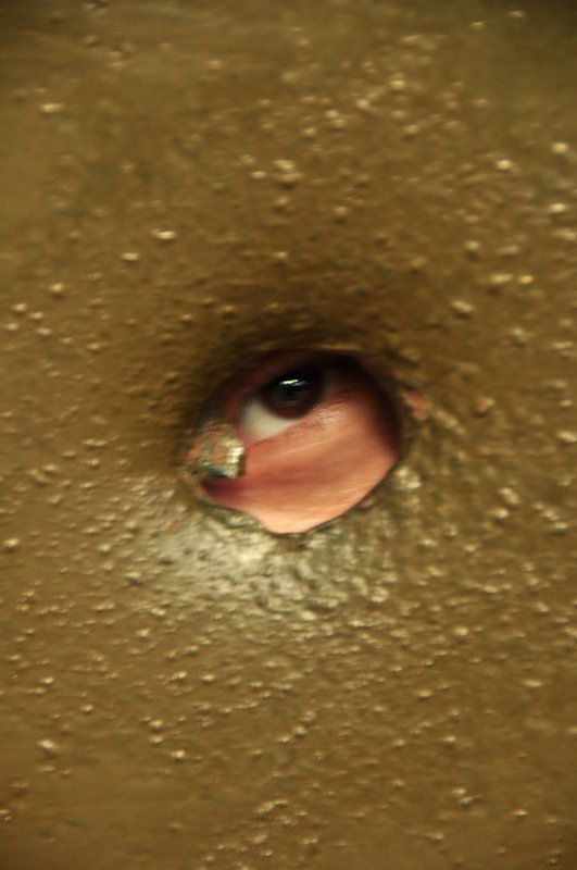 I'm watching you...thru a bullet hole!