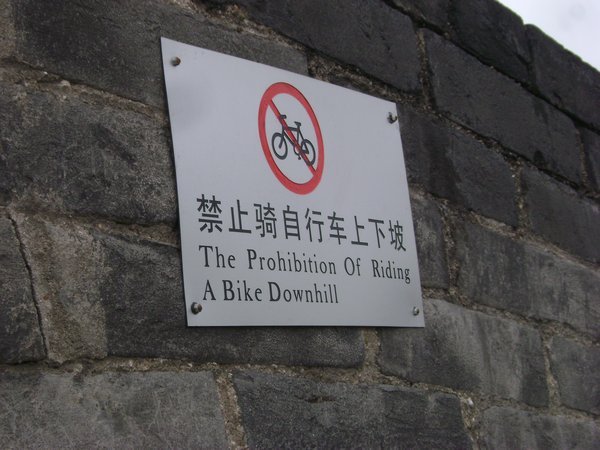biking on an old city wall