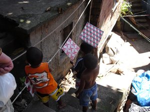 Favela kids recieve their favourite toy