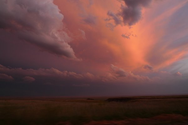 Sunset clouds over Badlands prairie