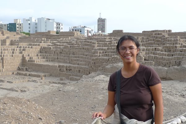 Eva at Huaca Pucllana with the city in the background