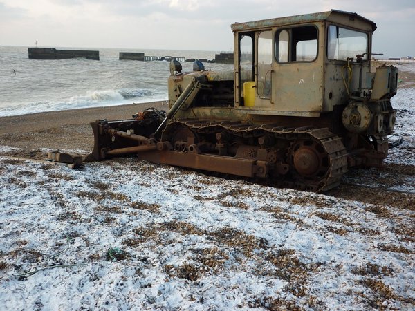 The fishing vessels are bulldozed  into the sea